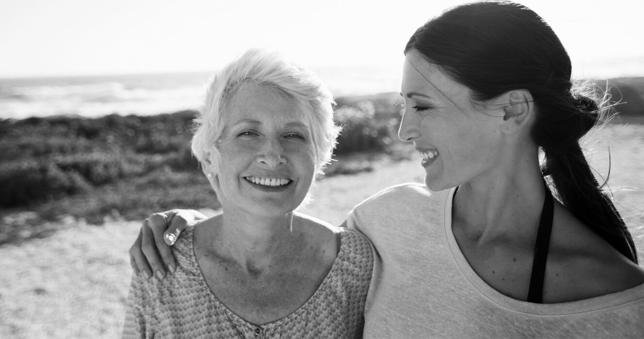 A woman embracing her mom