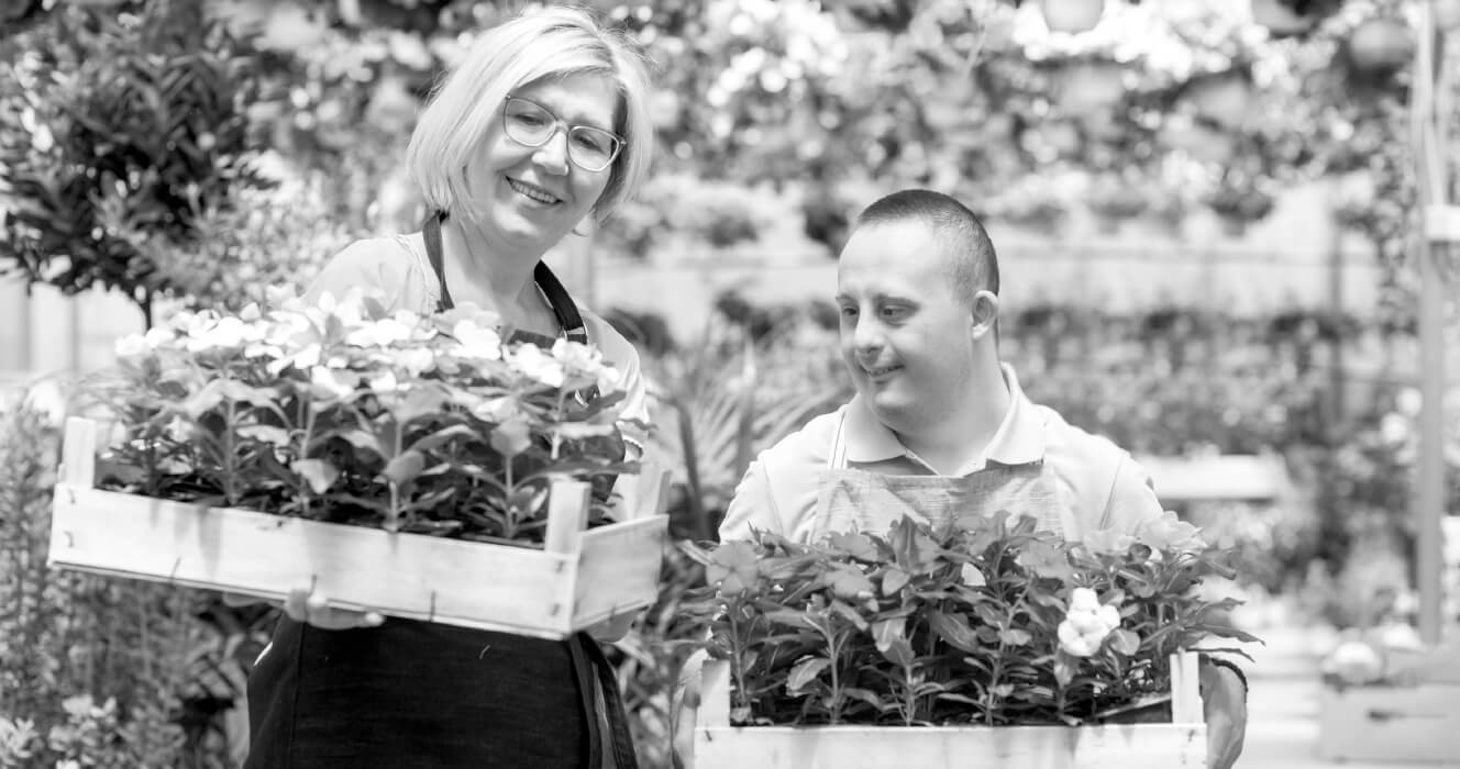 A mom and son out gardening