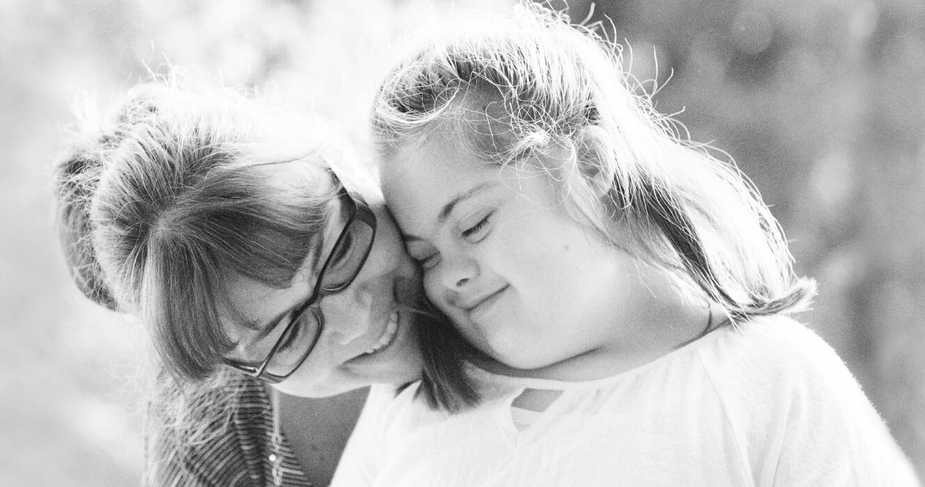 A mom and daughter outside enjoying the weather