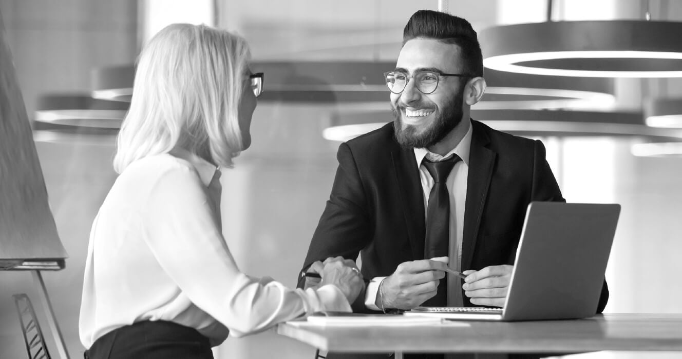 A business owner meeting with his client