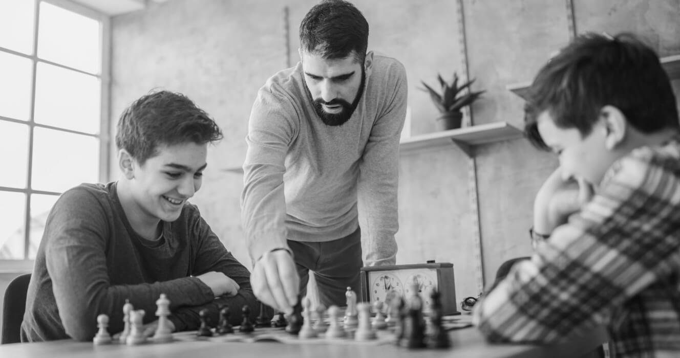 A group of friends playing chess