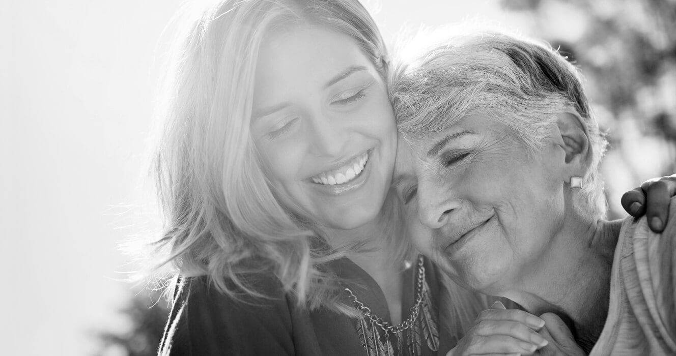 A daughter hugging her mom